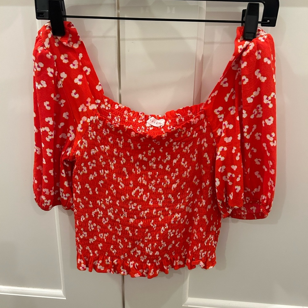 Lush coral flower printed smocked top